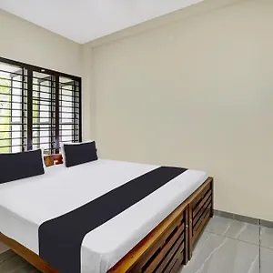 Hotel O Souparnika Residency Pathanamthitta